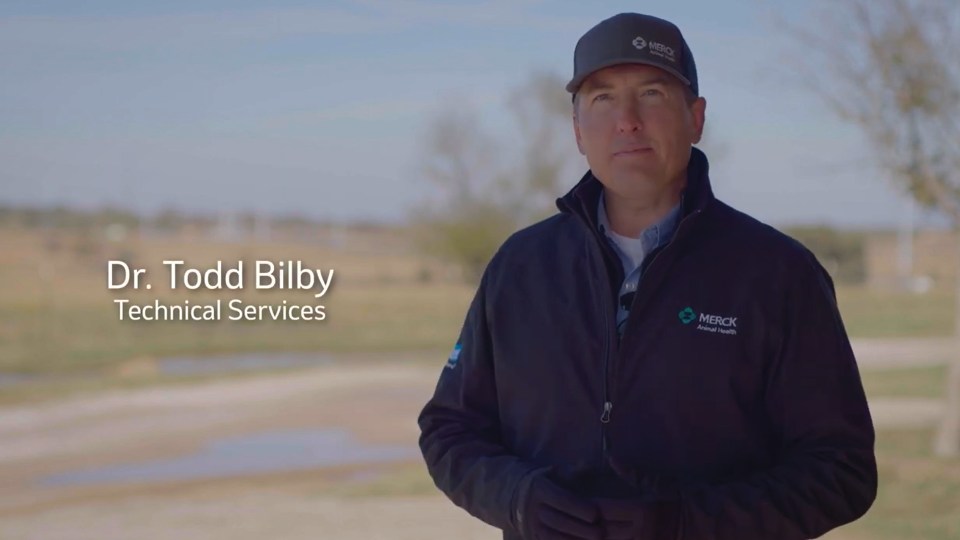 Dr. Todd Bilby in a Merck branded coat and hat.