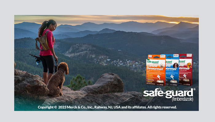 Woman hiking with her dog