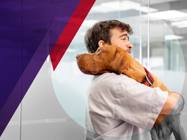 Man holding dog